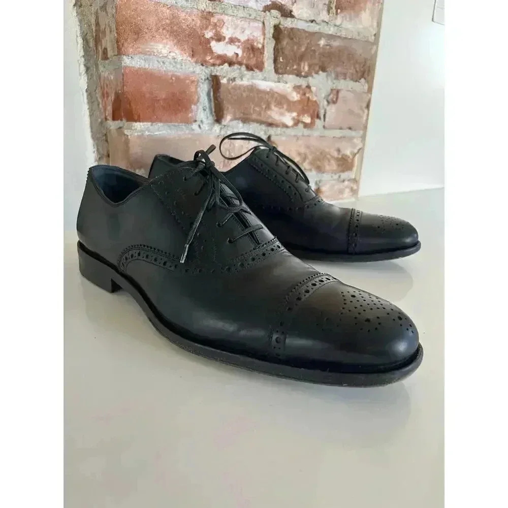 Salvatore Ferragamo Black Leather Wingtip Oxfords